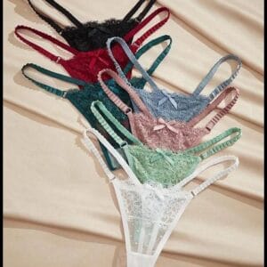 Charlaine 7 peças/pacote Calcinha Tanga Sexy de Renda com Laço Decorativo e Cintura Baixa em Cor Sólida para Mulheres