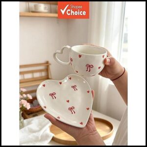 Conjunto De Xícara De Cerâmica E Pires De Coração Com Laço Rosa , Aparelho Para Bebidas Borda Ondulada De 280ml , Talher